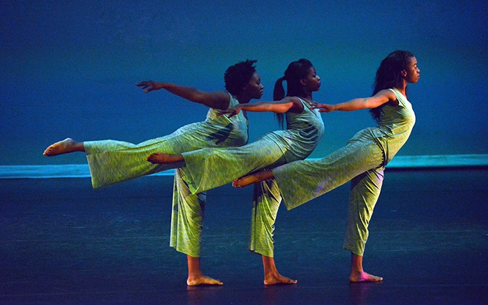 Group of dancers performing on stage