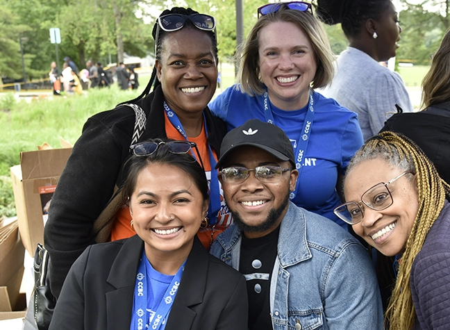 A group of volunteers gather to support CCBC's Community Resource Fair.