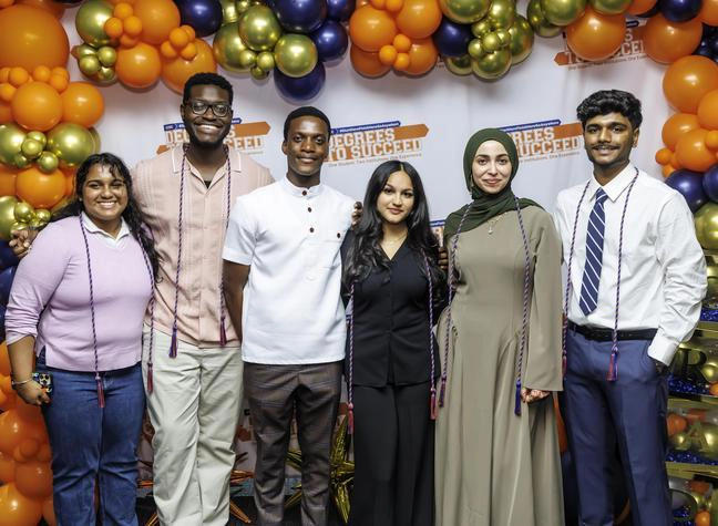Group of graduating students at the Degrees to Succeed Completion Ceremony.
