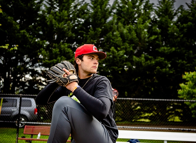 A pitcher practices his throw.