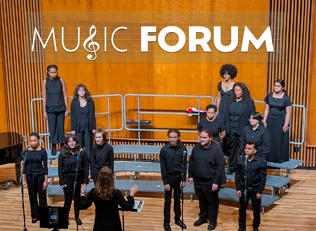 Group of students on stage singing