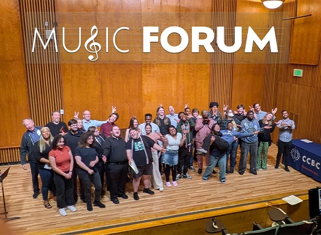 Group of students on stage singing