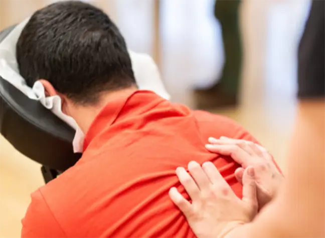 Woman getting a seated massage