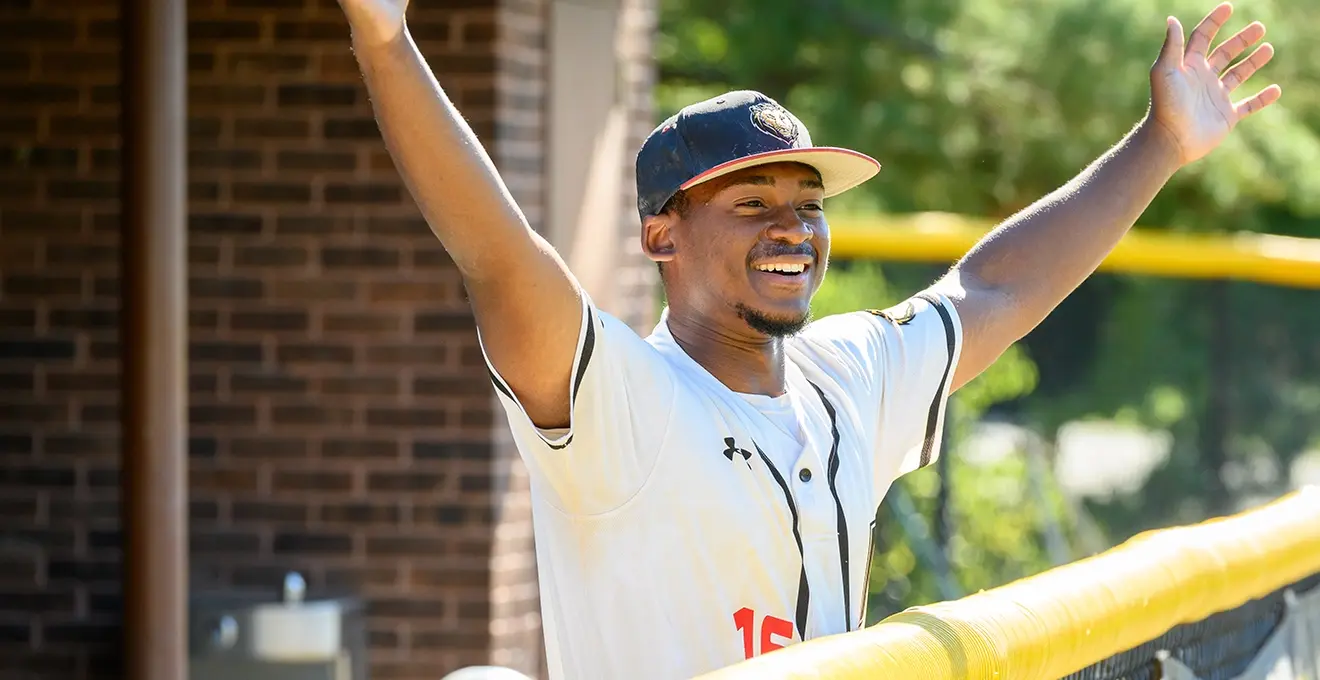 Carter cheers on his CCBC Baseball team