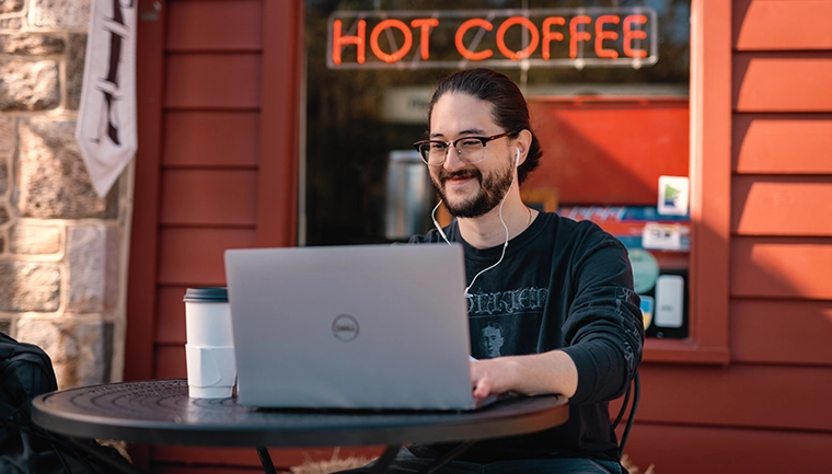 Male student with laptop