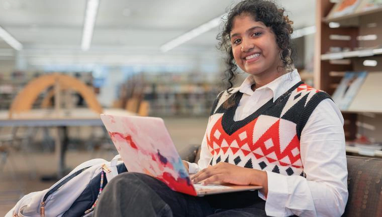 Student working on a laptop
