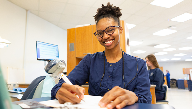 Dental student working in lab