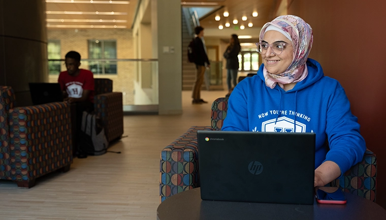 Female student with laptop