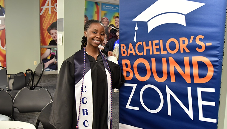 Student wearing Degrees to Succeed Shirt
