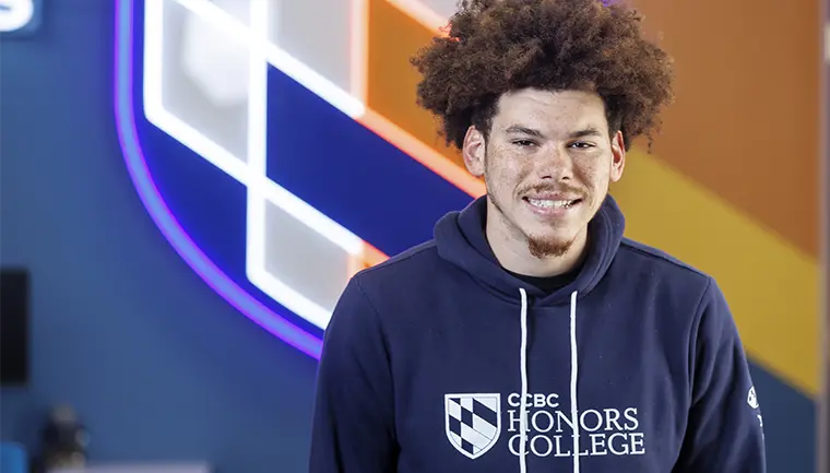 Student wearing a CCBC Honors College hoodie