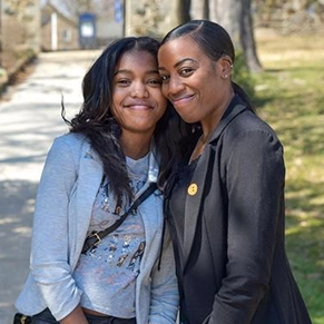 A mother and daughter together outside