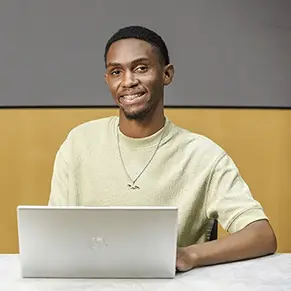 Photo of Jahleel Hall smiling. 