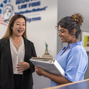 Female employer meeting with young employee