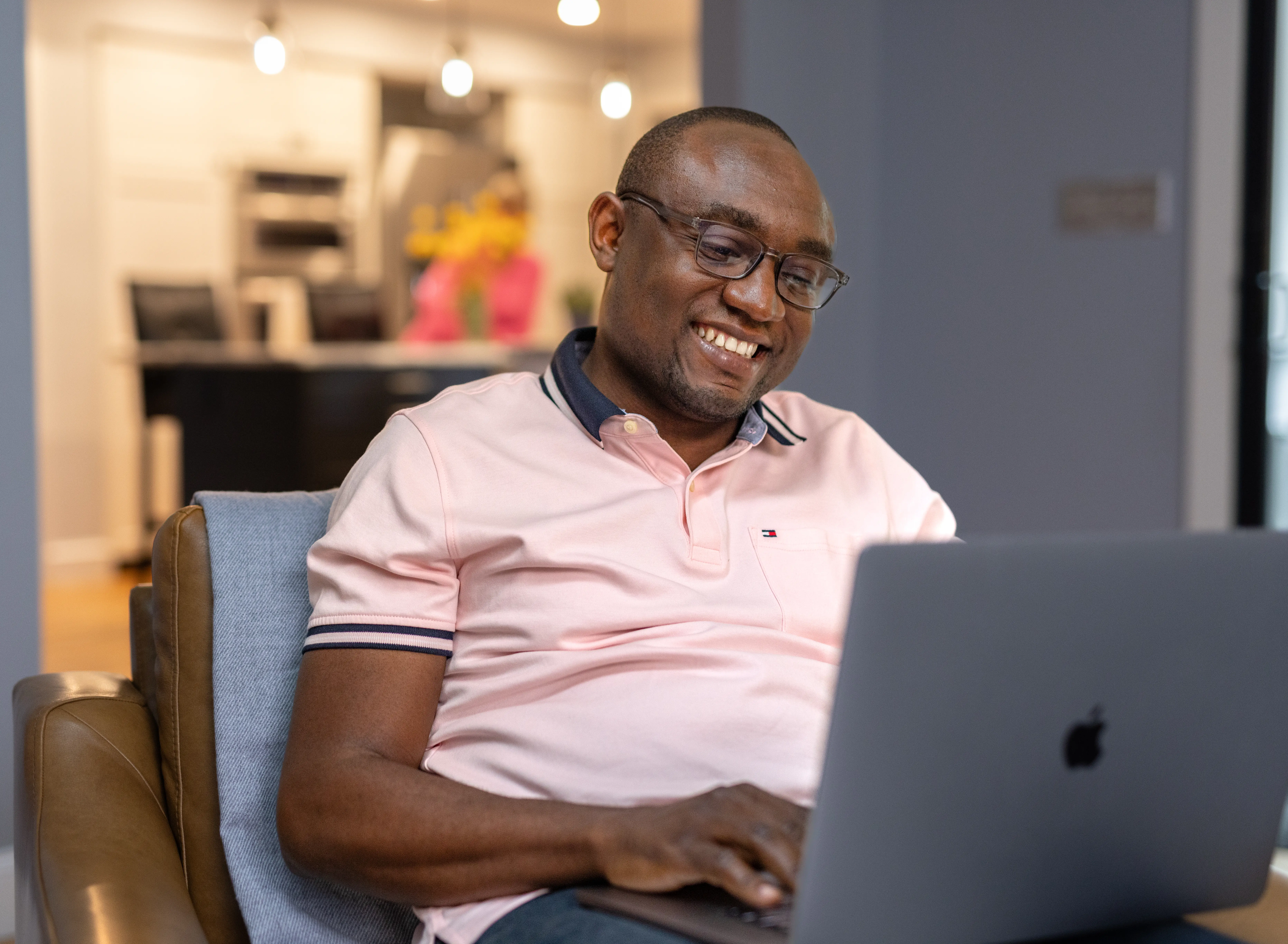 Man on laptop doing online classes