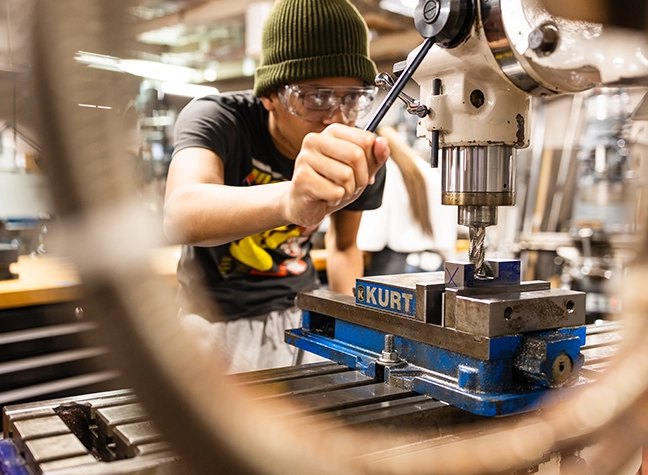 Two students working in the pharmacy technology lab