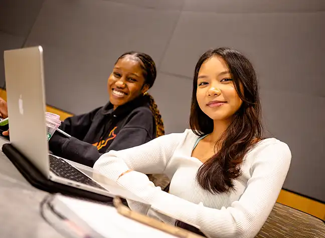 Two students sitting in class