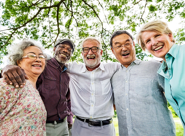 Group of smiling seniors outside