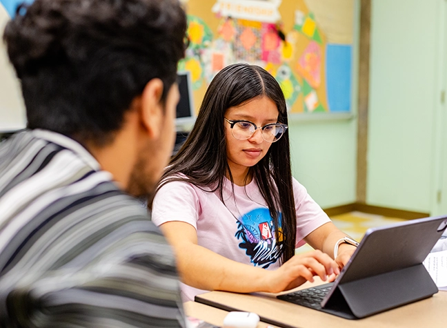 Student working at laptop