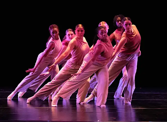 Group of CCBC dance students performing on stage
