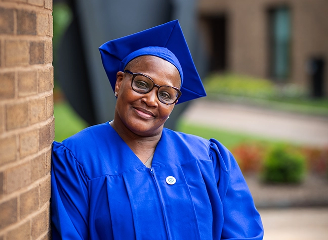 Photo of Lisa in her cap and gown
