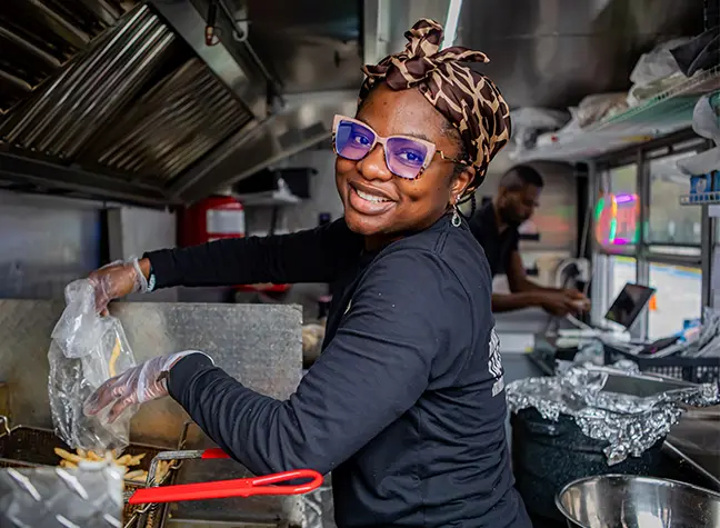Mimah Thompson working on her food truck