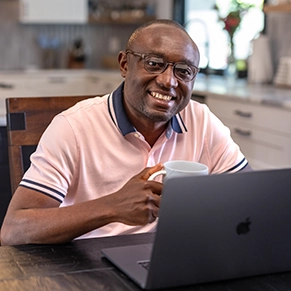 Student working at home on laptop
