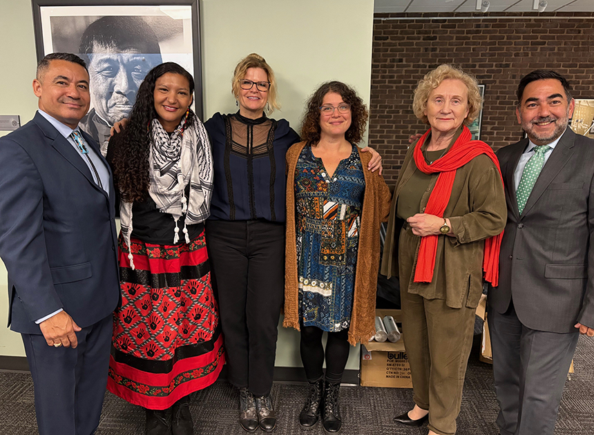 Keith Colston, administrative director for the Maryland Commission on Indian Affairs, poses at CCBC’s Indigenous Peoples’ Day Ceremony with (l-r) Courtney Sargent, Kim Jensen, Lauren Pollak, Sandra Kurtinitis, and Joaquin Martinez.