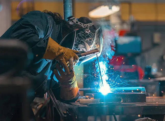 Welding student welding